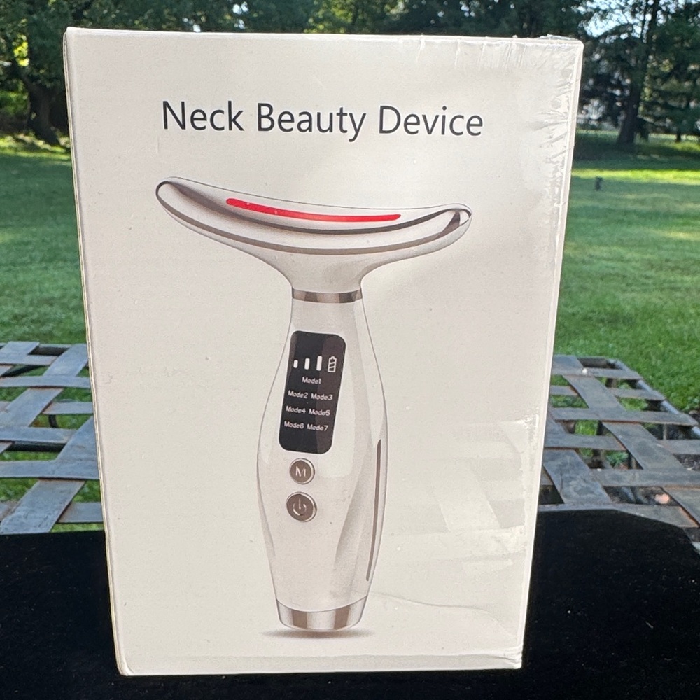 LED neck and face massager new in box